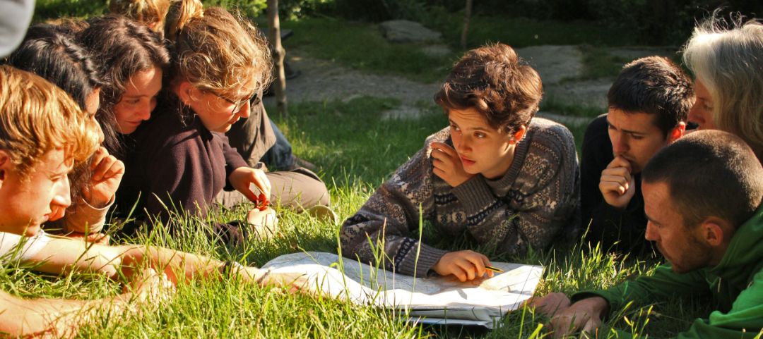 A group of students planning a walk outdoors