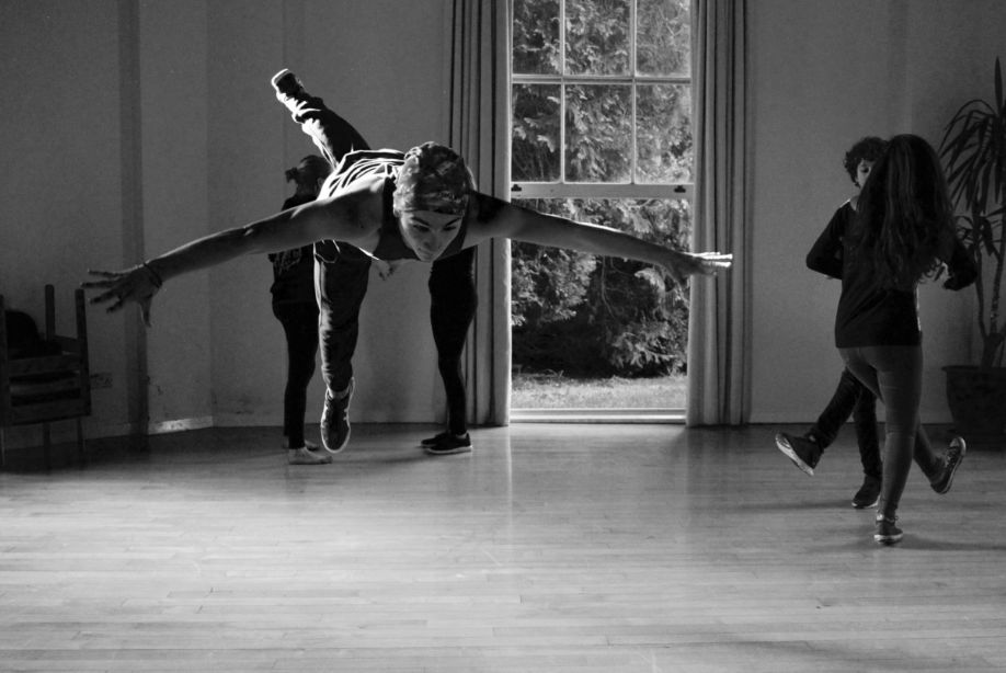 Brockwood Park School student performing a somersault