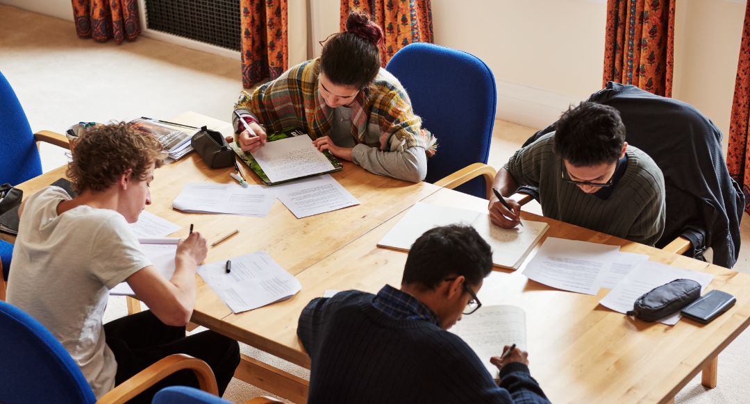 Brockwood Park School students focussing on studying together